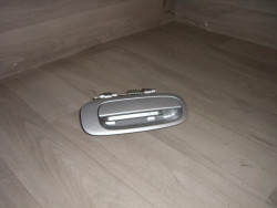 Poignee porte arriere droit...